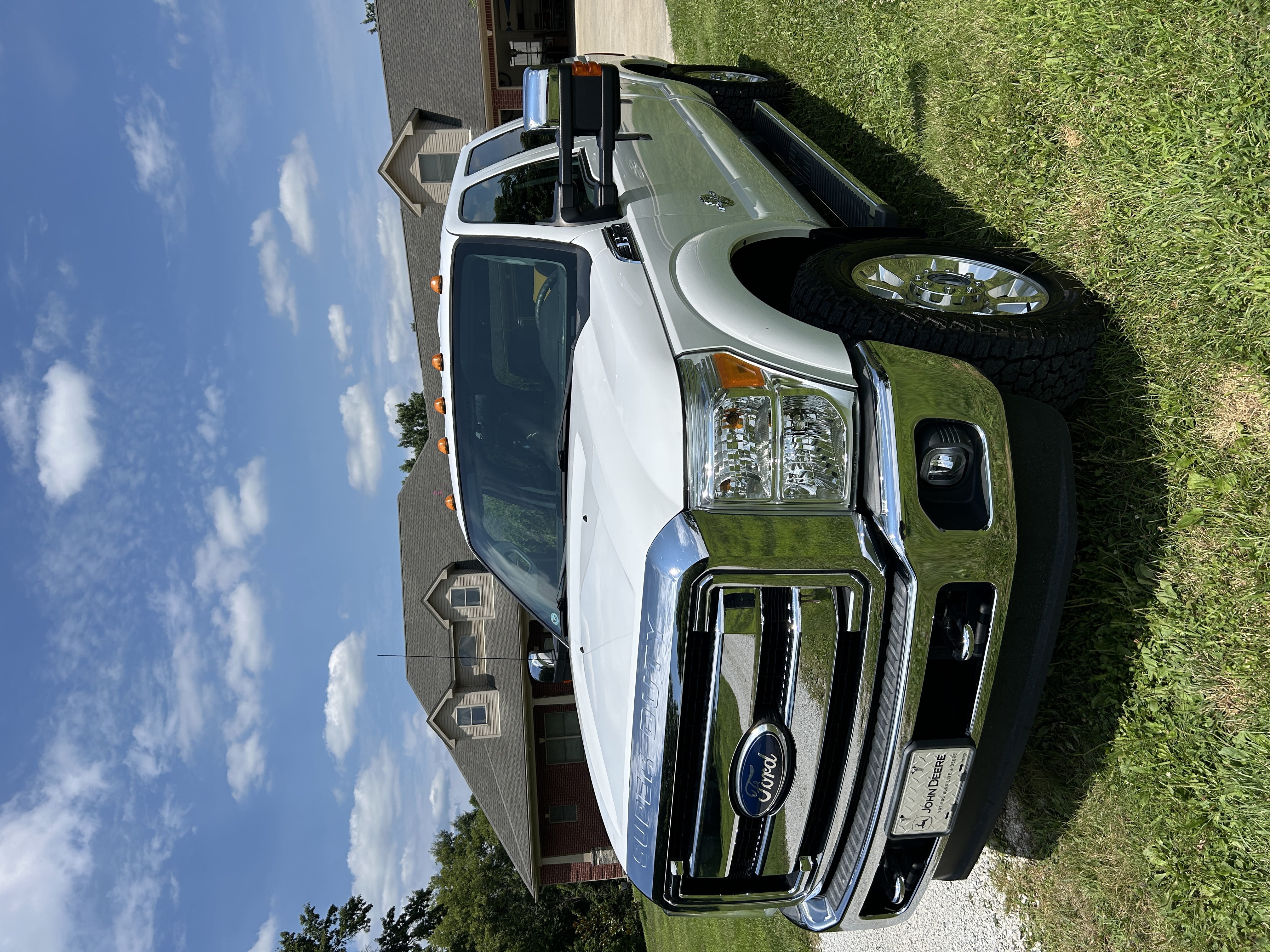 Clean white Ford Super Duty truck after a mobile full detail by RA Detailing